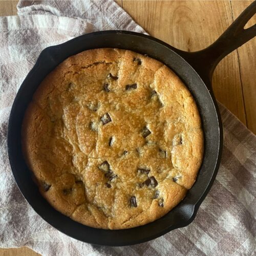 einkorn chocolate chip skillet cookie in a cast iron skillet