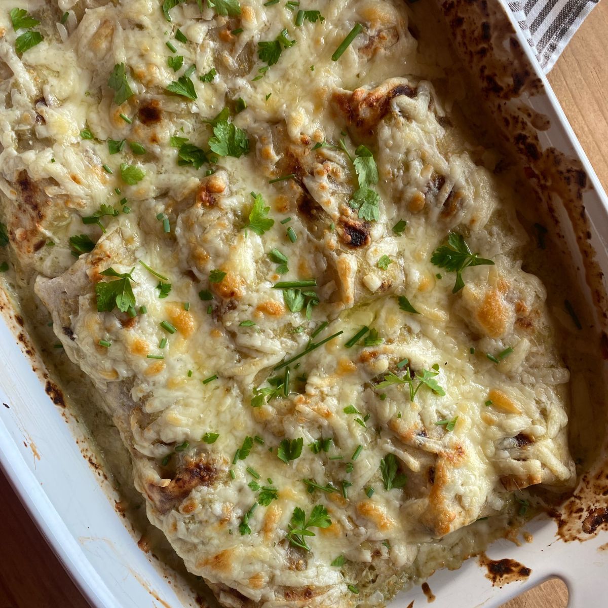 Creamy Salsa Verde Chicken Enchiladas