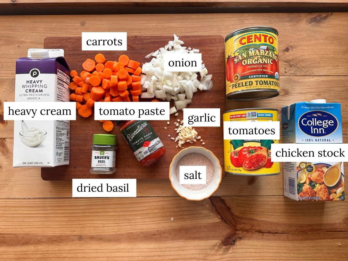 a labeled ingredient photo of ingredients needed to make creamy tomato soup
