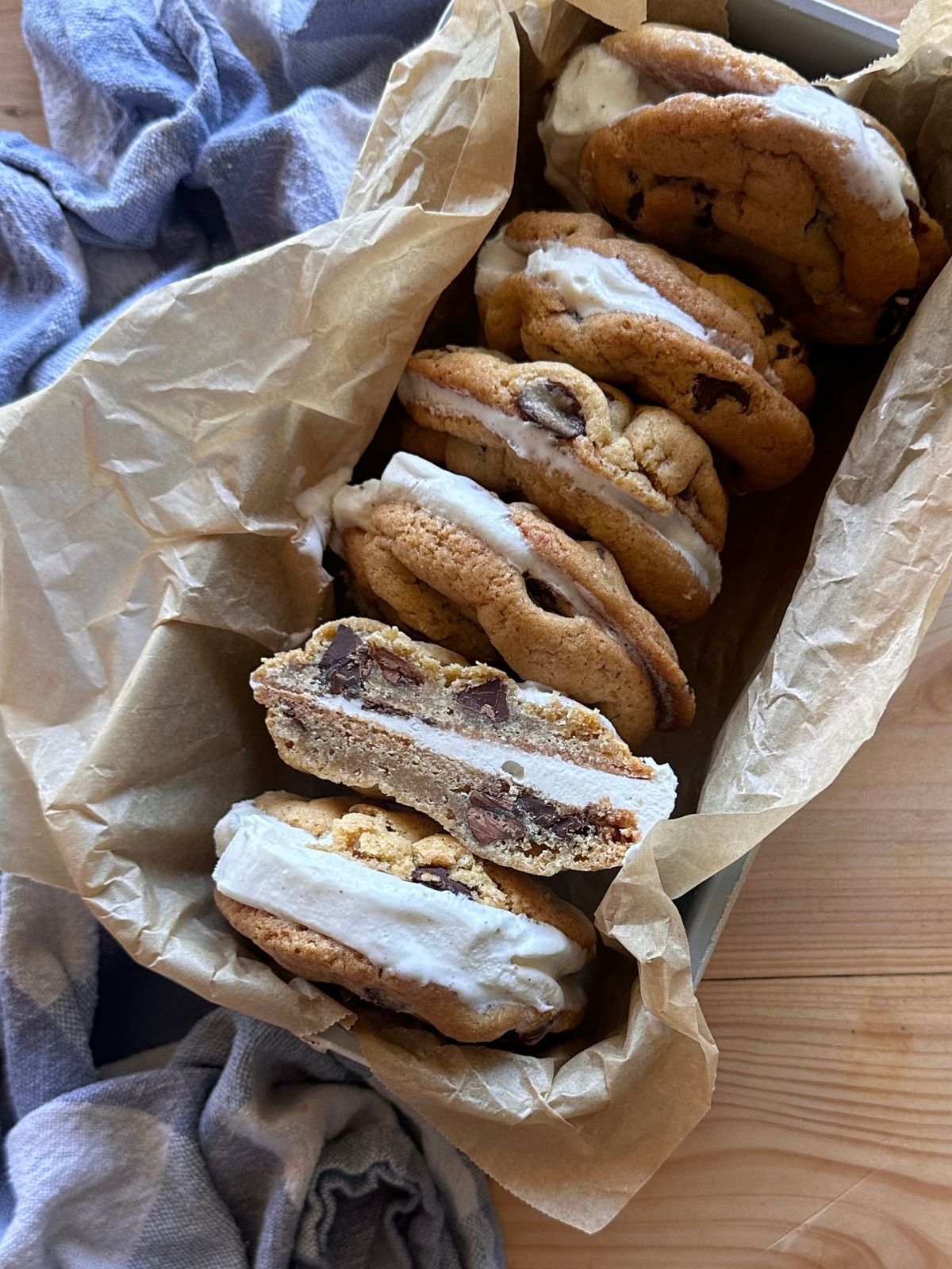 assembled sourdough ice cream sandwich cookies lined up in a baking dish